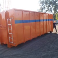 Abrollcontainer mit 36 m³ Volumen, offen ausgeführt in Blau und mit Pendelklappe zum einfachen Entladen